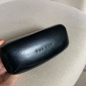 The Row black sunglasses case with cloth